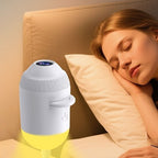 The projector in night light mode next to a bed
