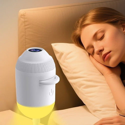Le projecteur en mode veilleuse près d'un lit